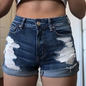 ae blue ripped shorts
